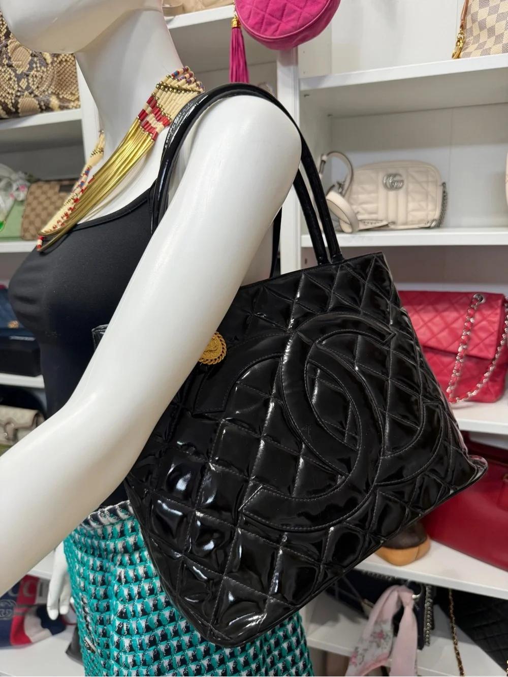 CHANEL Black Quilted Patent Leather Tote with Gold Medallion Charm